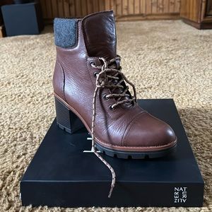 Brown boots, never worn. New in box, size 8